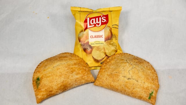 2 Jamaican Spinach Patties + Bag of Chips.
